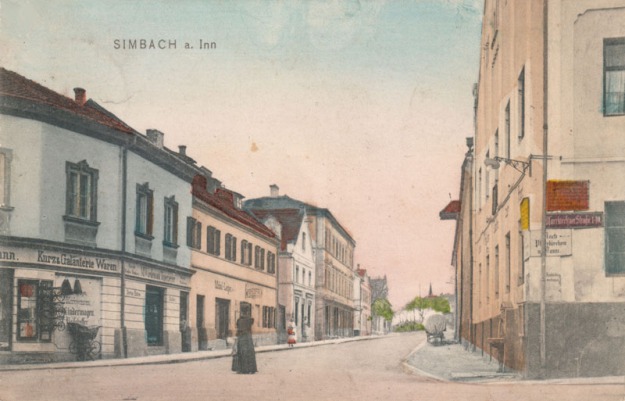 Die Münchner Straße vom Stachus aus, mit dem Geschäft von Martin Wiedemann (links)