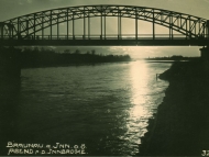 Ansichtskarte mit Sonnenuntergang an der Innbrücke